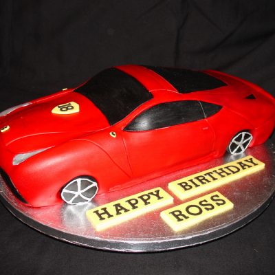 Red Race Car Shaped Cake